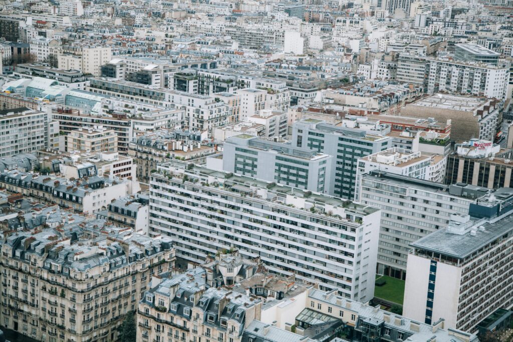 Aerial perspective of urban architecture in Paris, showcasing the blend of modern and classic structures.